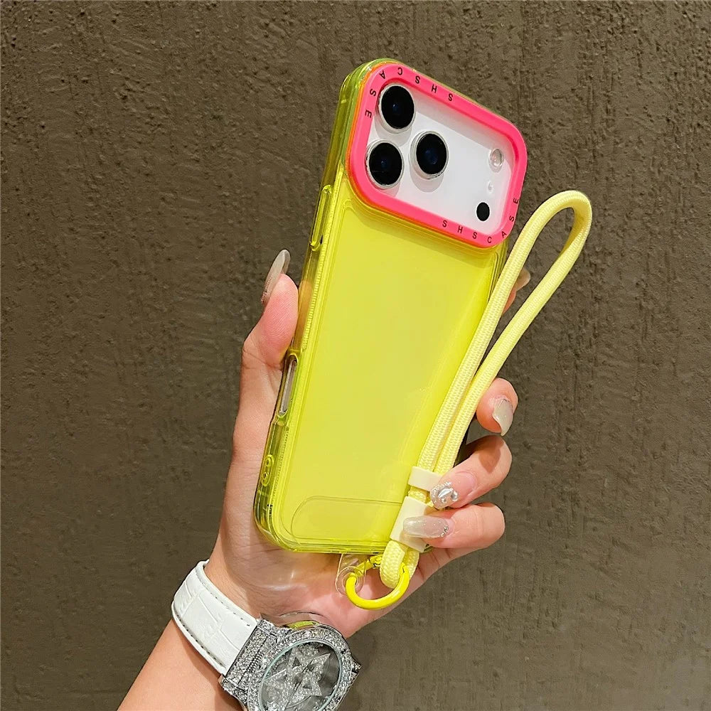 For iPhone 18 Pro Max / 17 Pro Max Case Clear Contrasting Colors Shockproof TPU Phone Back Cover with Wrist Strap - Yellow - 1