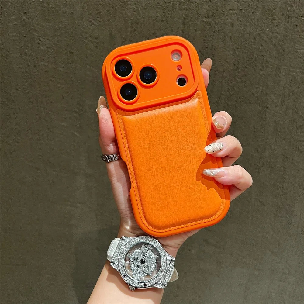 For iPhone 17 Pro Max Case Round Hole Shockproof PU + TPU Phone Back Cover - Orange - 1