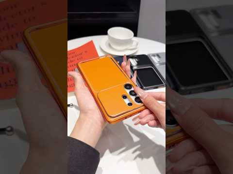 For iPhone 15 Magnetic Case Metal Frame PC Back Phone Cover with Pop-Up Buckle - Orange
